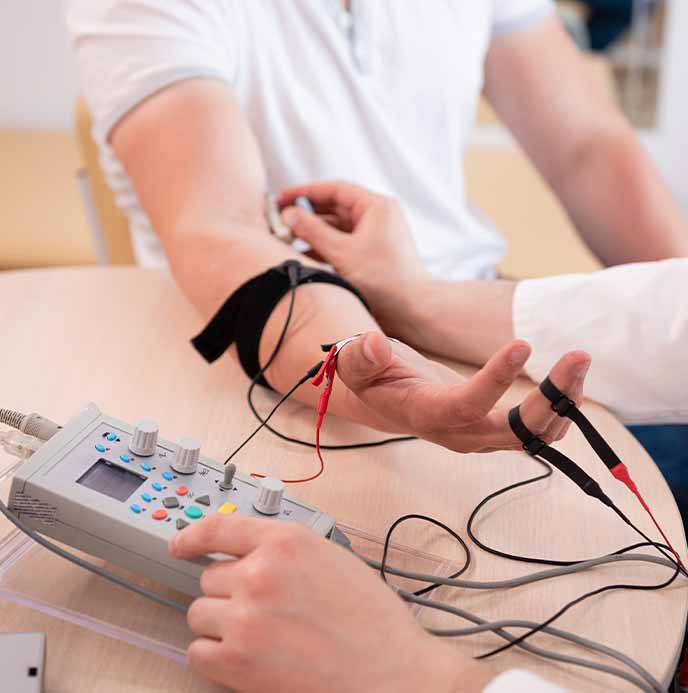 Doctor at South Bay Wellness Center evaluating a patient for neuropathy